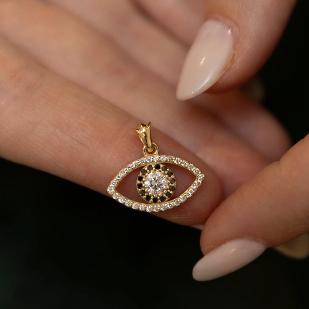 Jess evil eye pendant close-up showing diamond detail