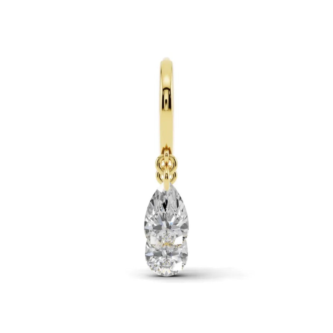 Floating diamond tassel huggie styled on ear