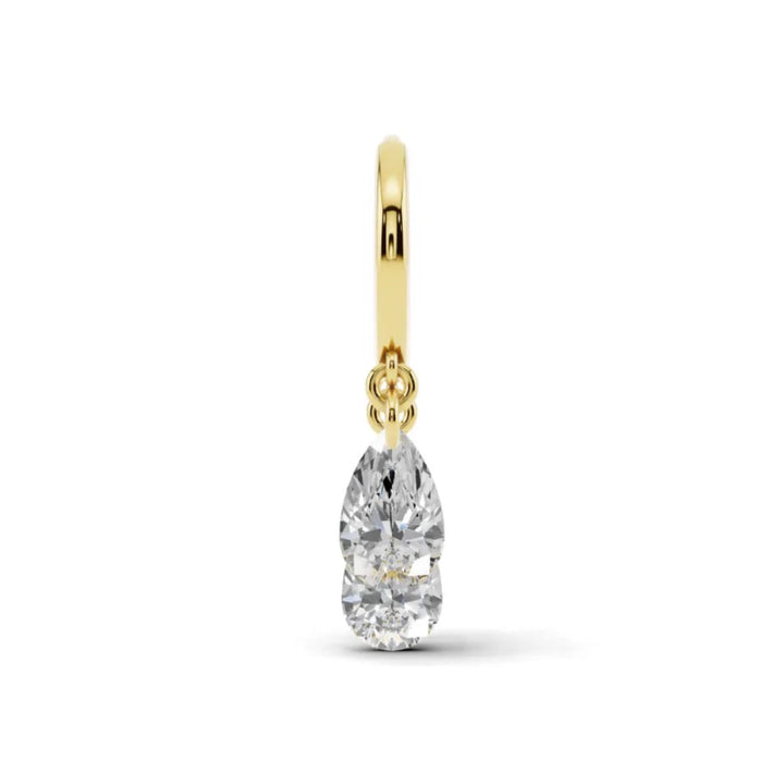 Floating diamond tassel huggie styled on ear
