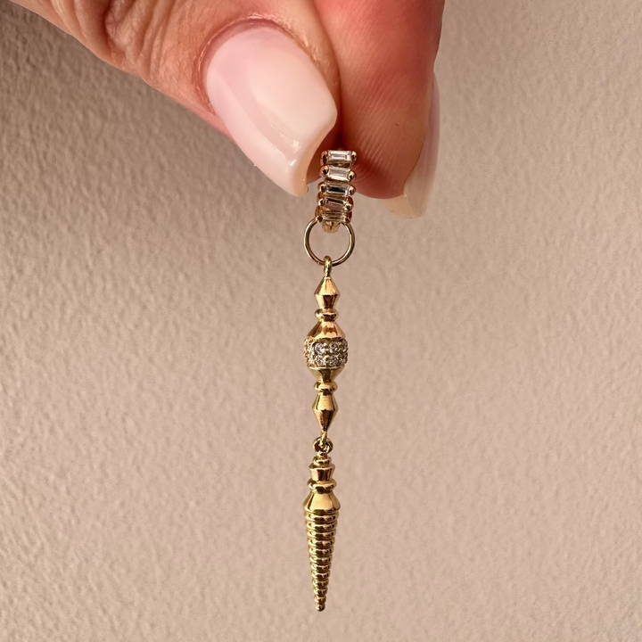 Long diamond spiral charm styled on ear